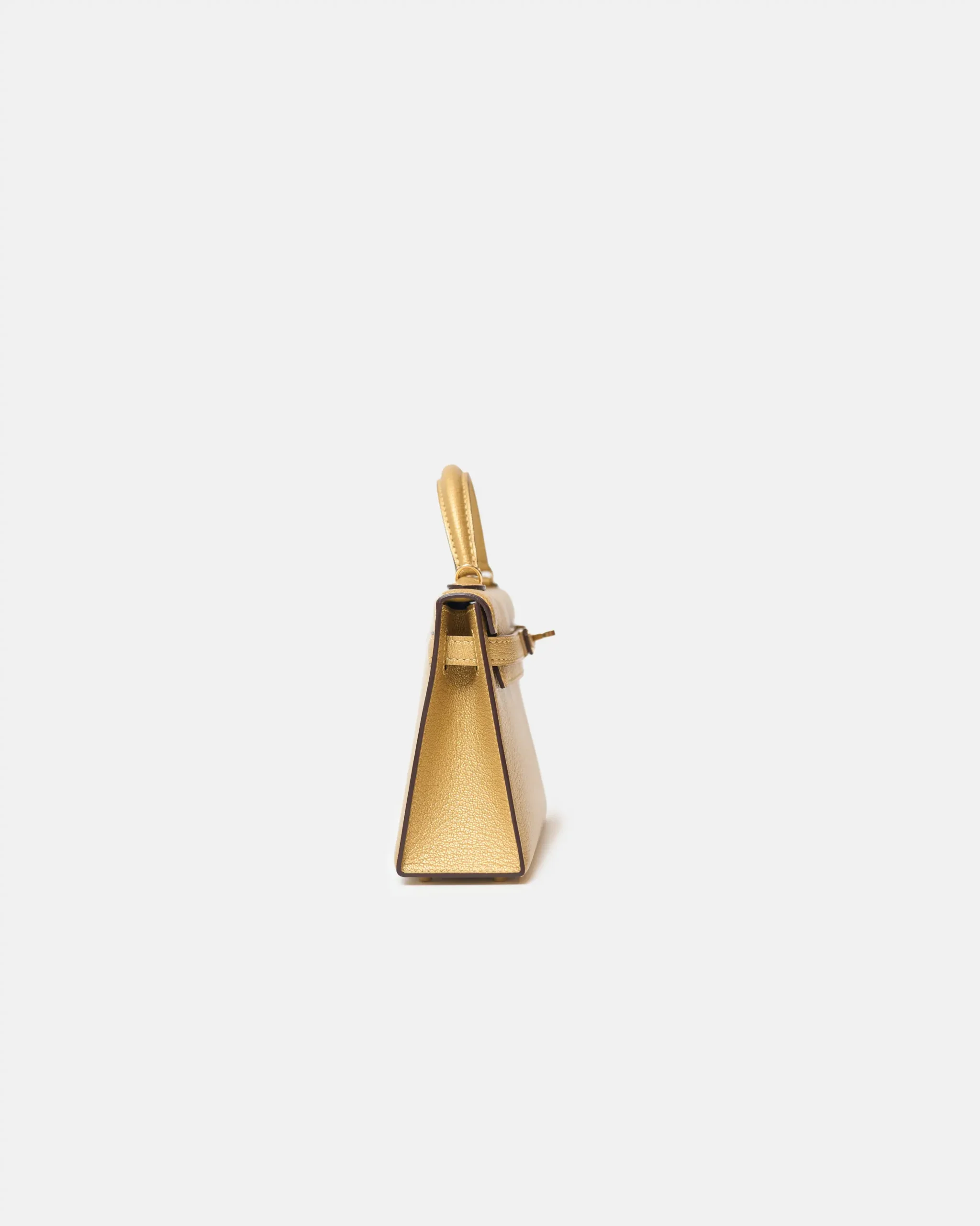 Hermès Mini Kelly 20 Dore Chèvre Chamkilight Permabrass