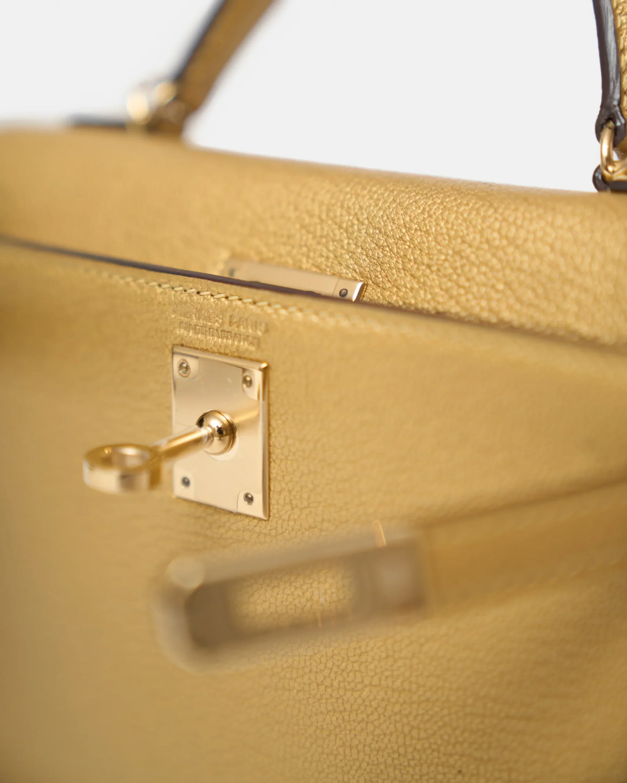 Hermès Mini Kelly 20 Dore Chèvre Chamkilight Permabrass